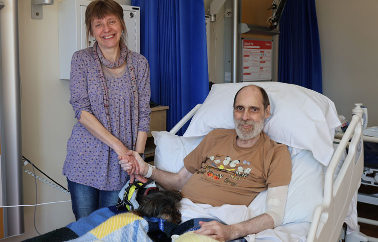 Claire and Bradley with their dog at St Helena Hospice